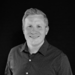Black and white headshot of Jay Buerck, Director of Analytics, Graphite