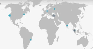 World map with marked locations using blue dots, two of which have a symbol overlay.
