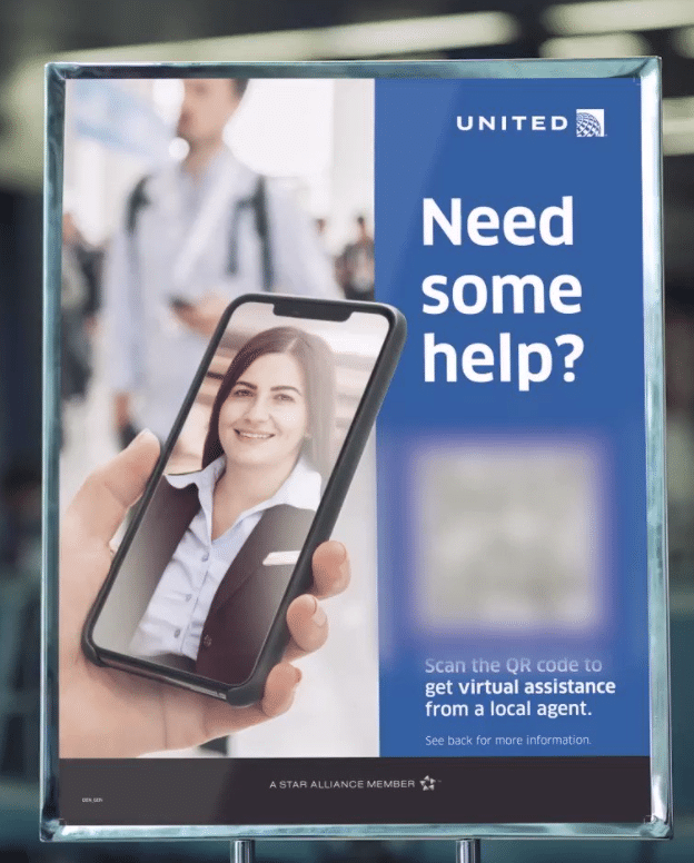 photograph of an advertisement from United Airlines showing a QR code to download their app