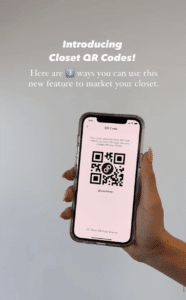 Hand holding a phone showing a branded QR code