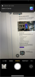 Phone scanning an email QR code to download the app