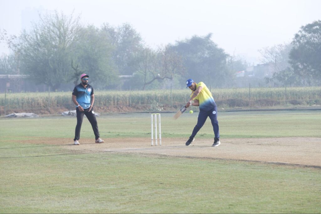 Photo of two cricket players in action.